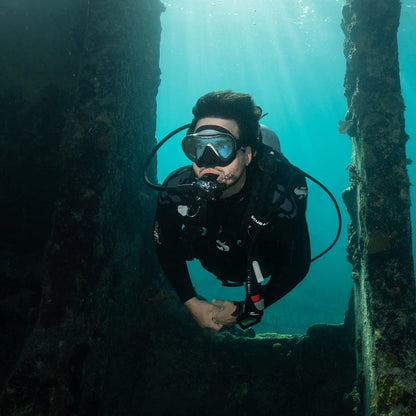 Scuba diver exploring underwater structure (SP_11700000_A700)