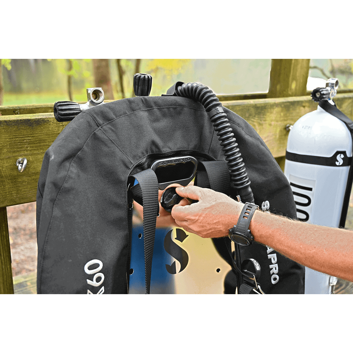 Scubapro S-Tek Donut 60 BCD with tank and hand adjusting.