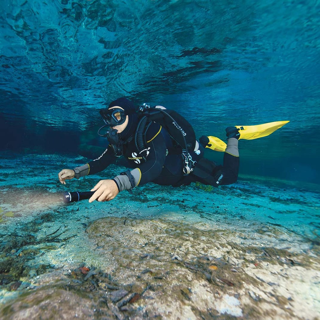 Scuba diver underwater with S-Tek equipment
