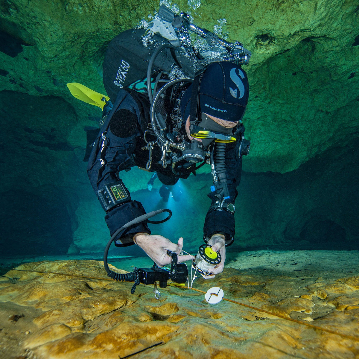 Scuba diver underwater, adjusting equipment - SP_40204001_S-Tek_CookieMonster_5