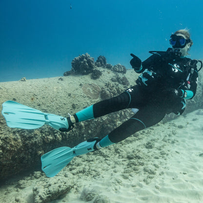 Scuba diver in 3mm Sport Steamer pointing underwater