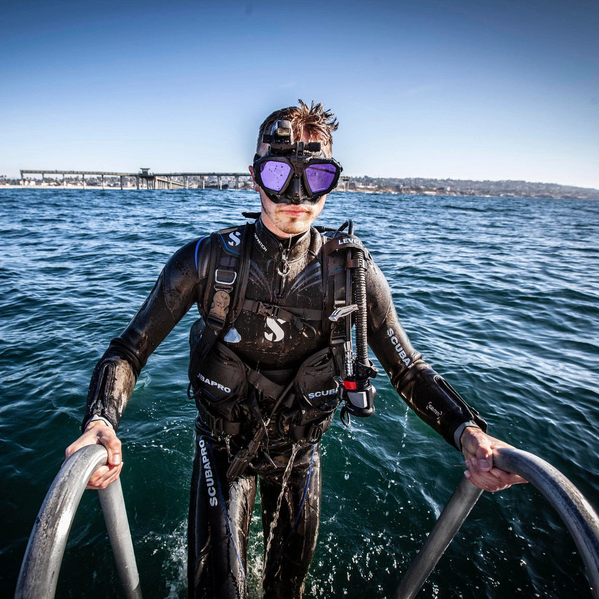 Scuba diver in ocean with SCUBAPRO Definition 5MM wetsuit