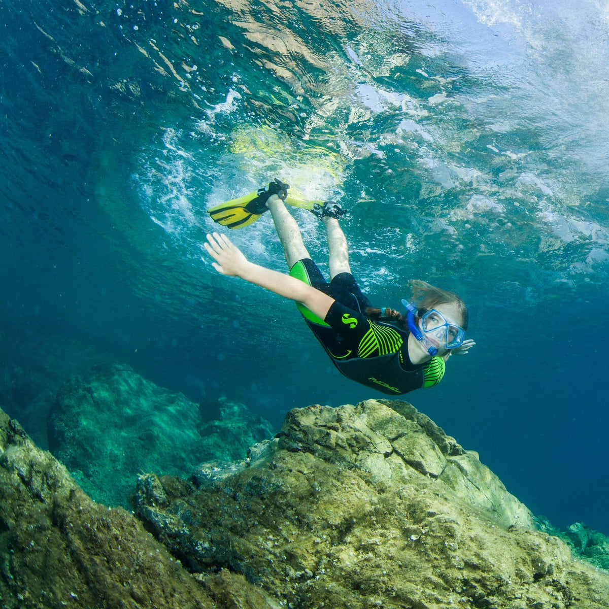 Scuba diver in SP_REBEL Shorty underwater.